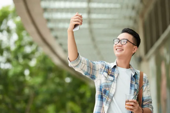 Field employee clocking in with a selfie